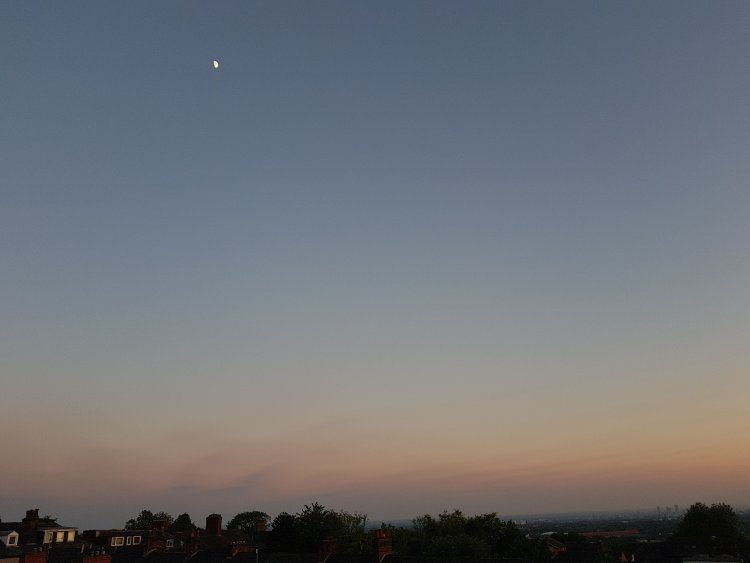 Half moon just before sunset on the 7th of Ramadan