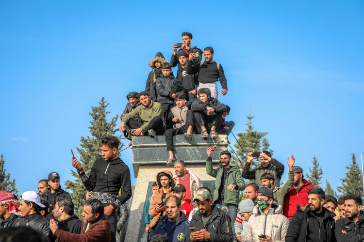 A gathering of the people and residents of Daraa city in Al-Karama and Al-Hurriya Square after the fall of Bashar Al-Assad